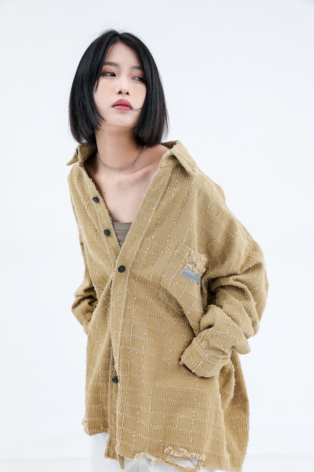 Olive drab green insulated bottle with flared screw lid and flat top.